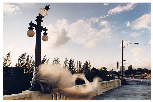 Blowing Plastic On Bridge